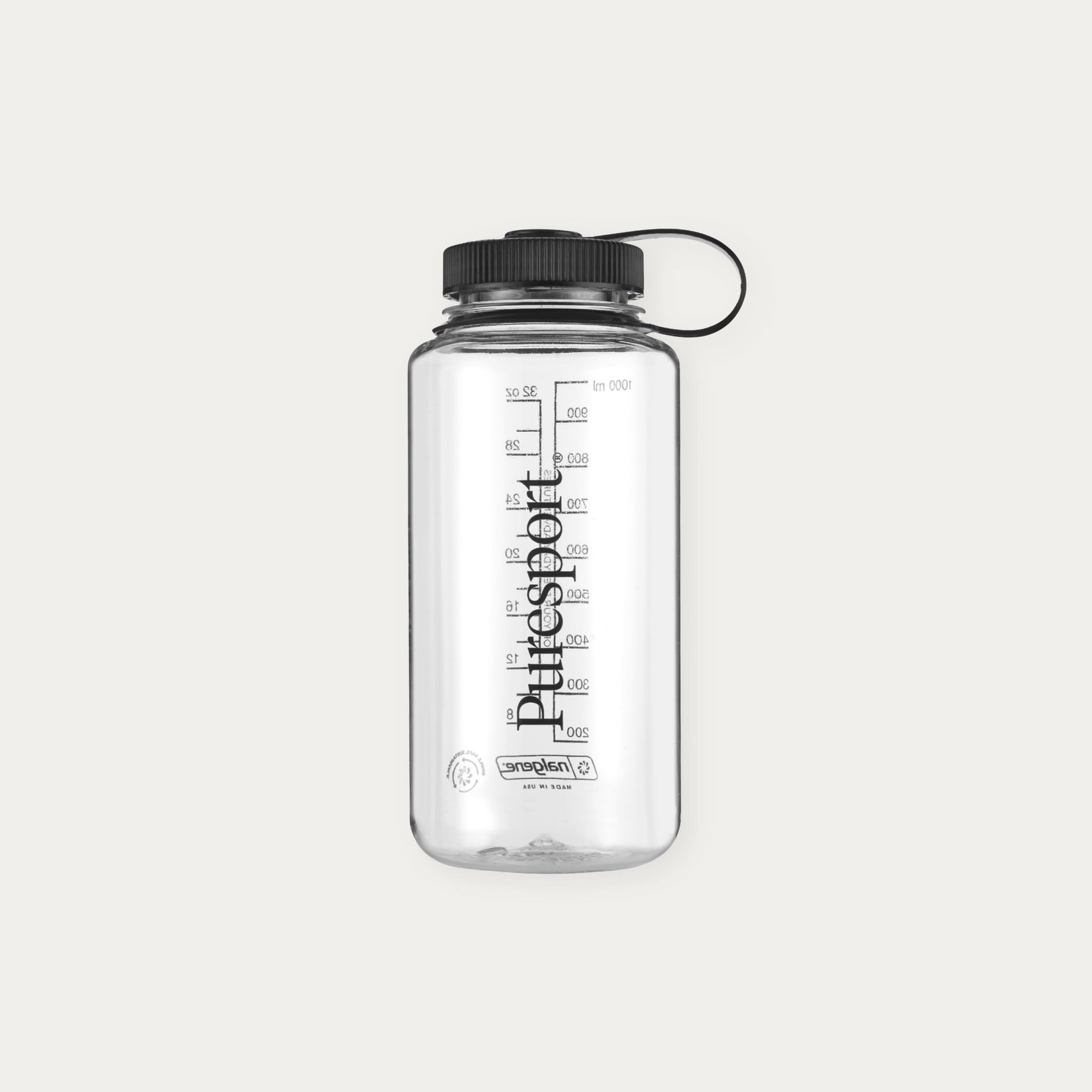 Clear water bottle by Puresport with black lid and measurement markings on a light gray background