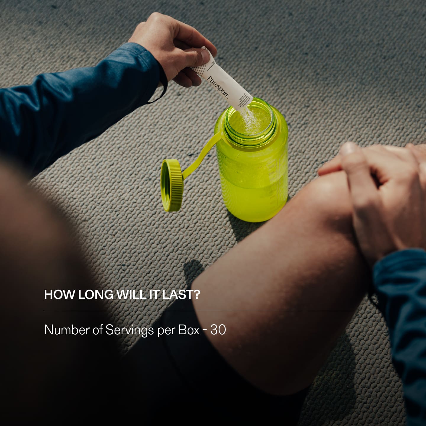 Person pouring electrolytes into a Puresport sports bottle