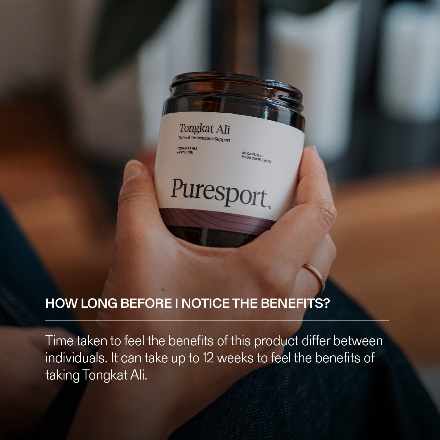 Hand holding a jar of Puresport Tongkat Ali supplement with text about benefit timing.