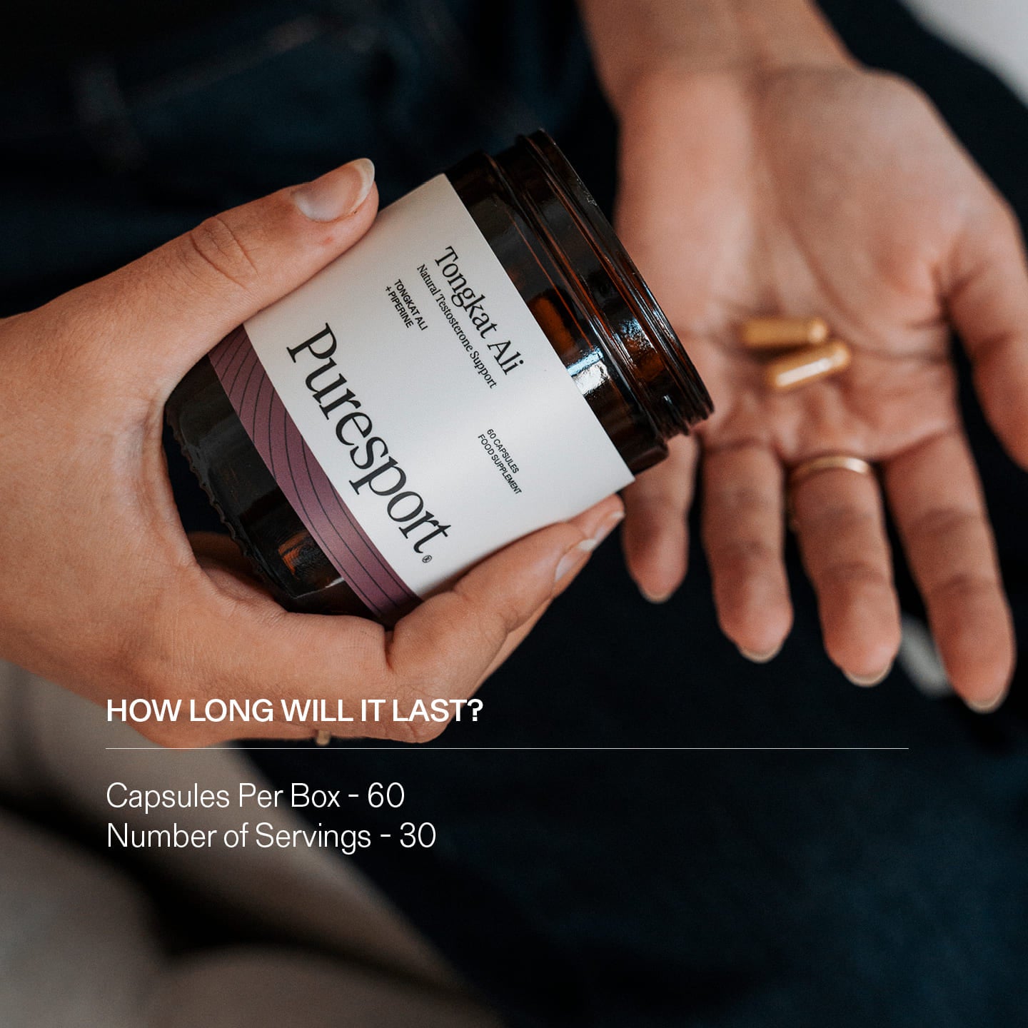 Person holding a jar of Tongkat Ali supplements with capsules on a hand.