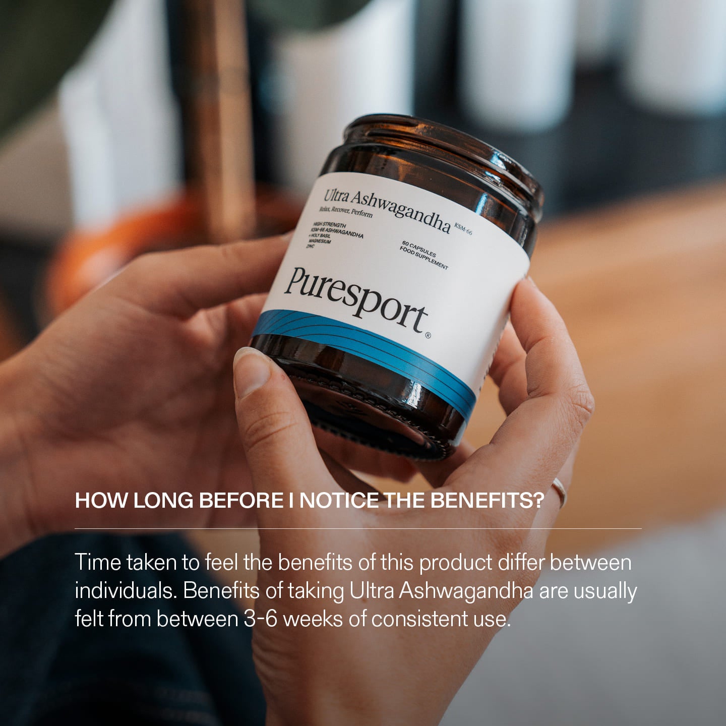 Person holding a jar of Puresport Ashwagandha with text about when to notice benefits.