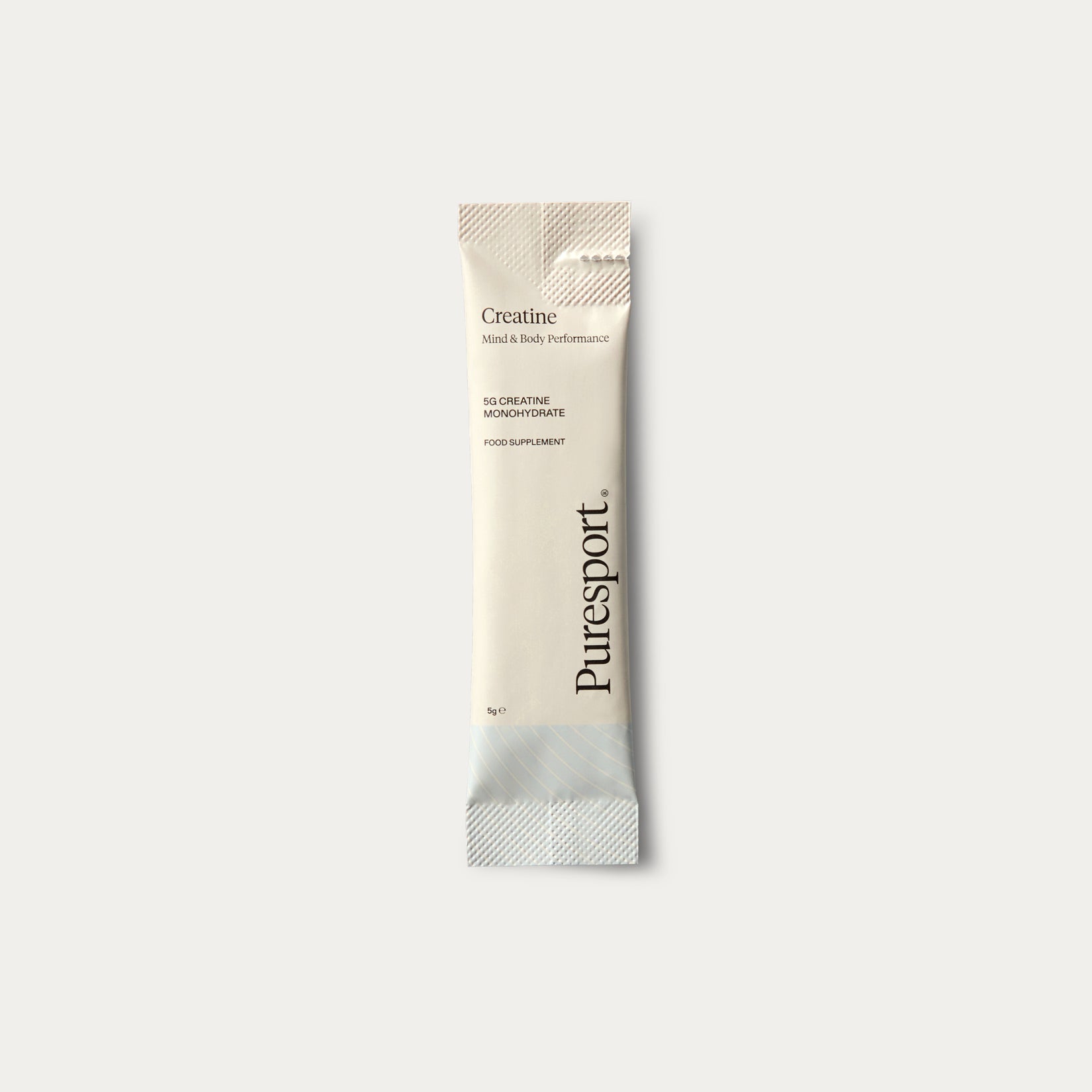 A sachet of Puresport Creatine Monohydrate, for mind and body performance.
