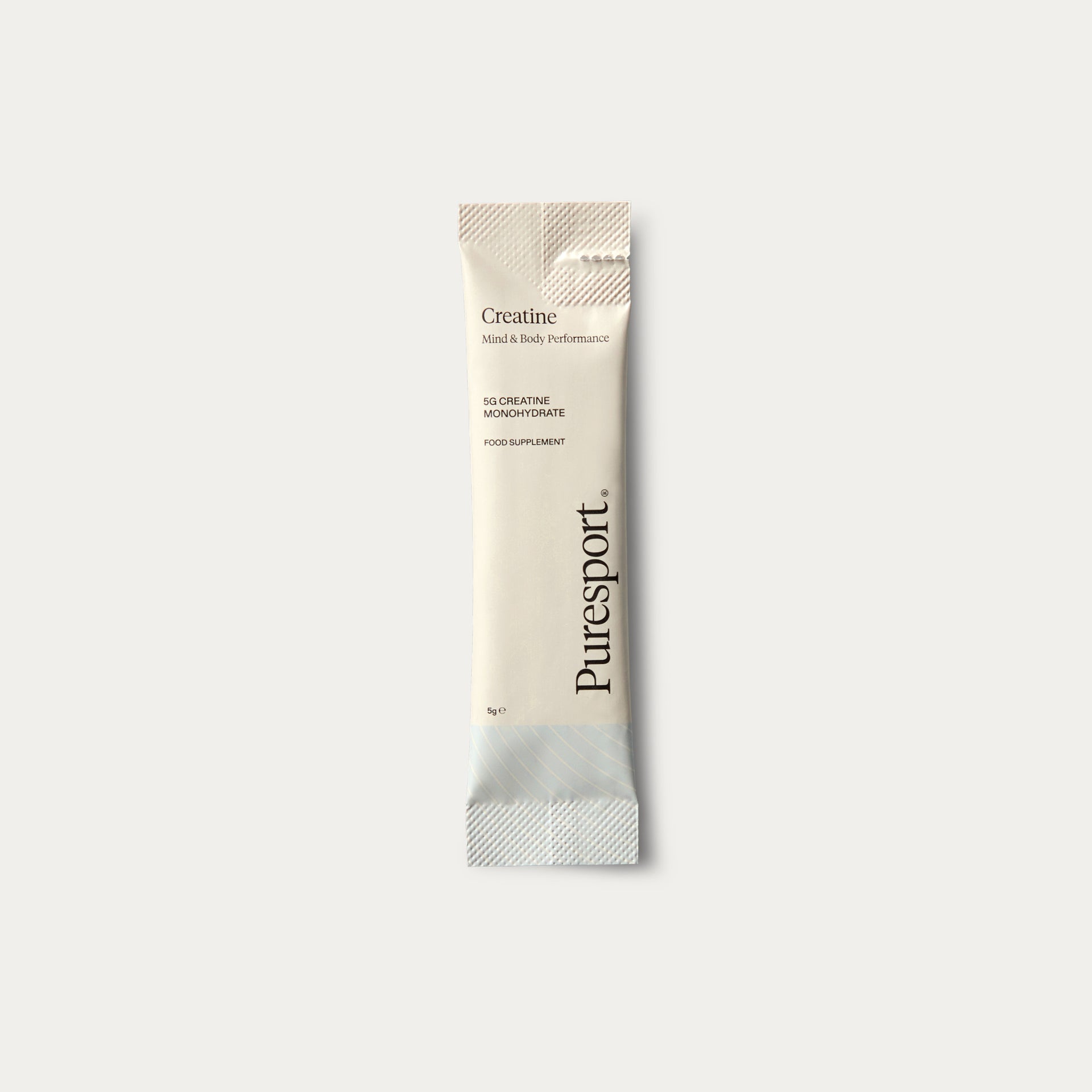 A sachet of Puresport Creatine Monohydrate, for mind and body performance.