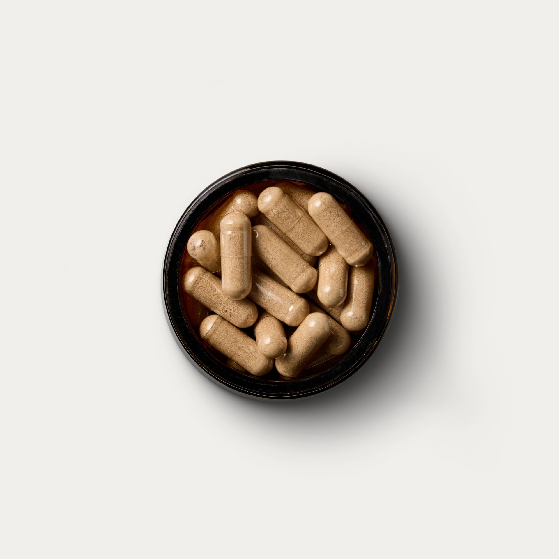 A open supplement jar of Lion's mane by Puresport.