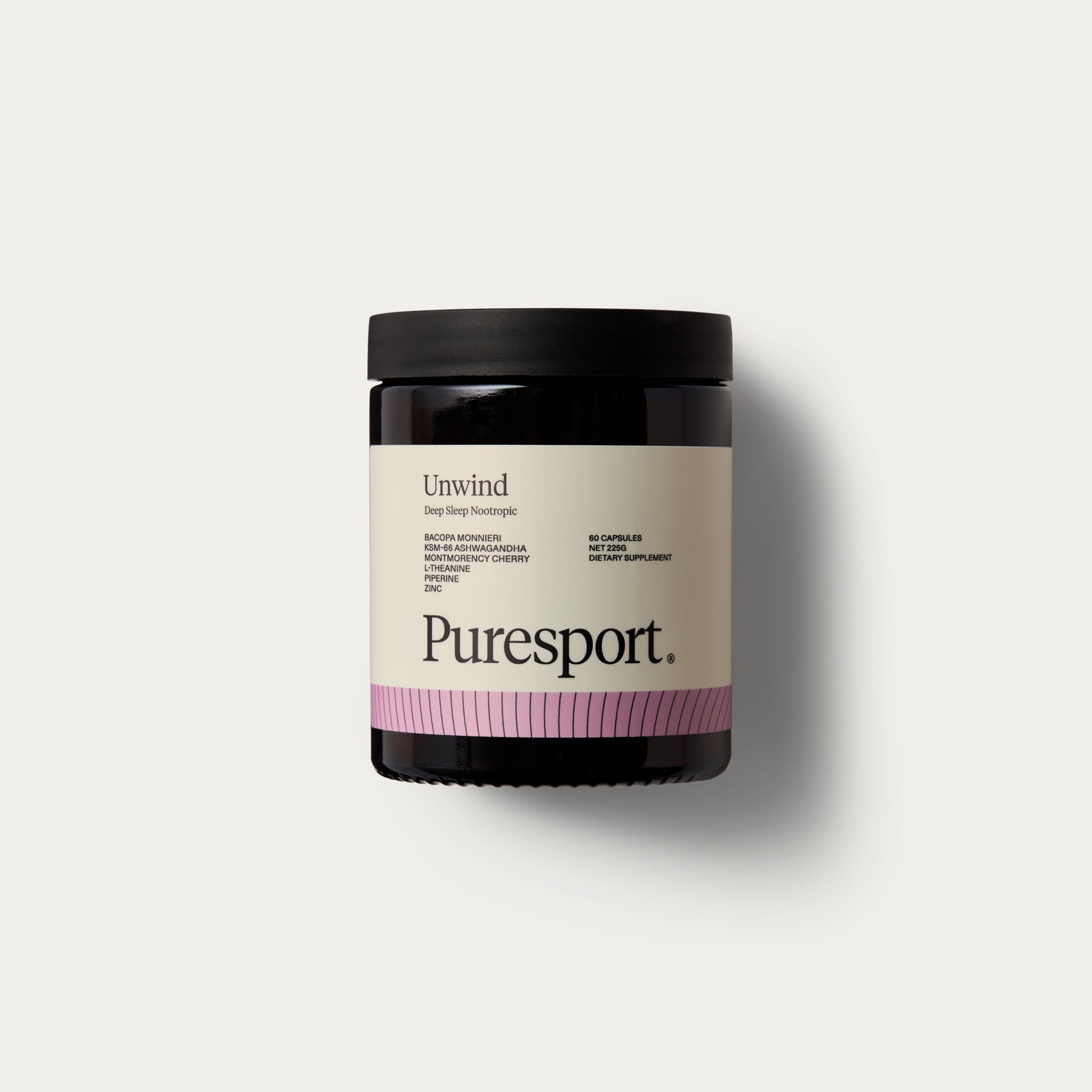 A bottle of Unwind Nootropic Capsules by Puresport against a white background.