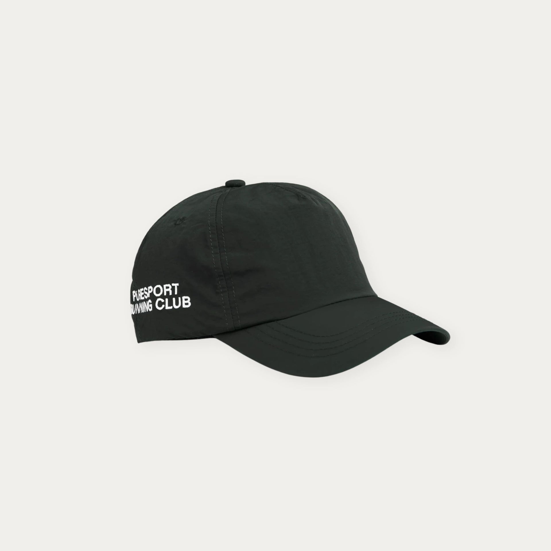 Black run cap with white text on the panel