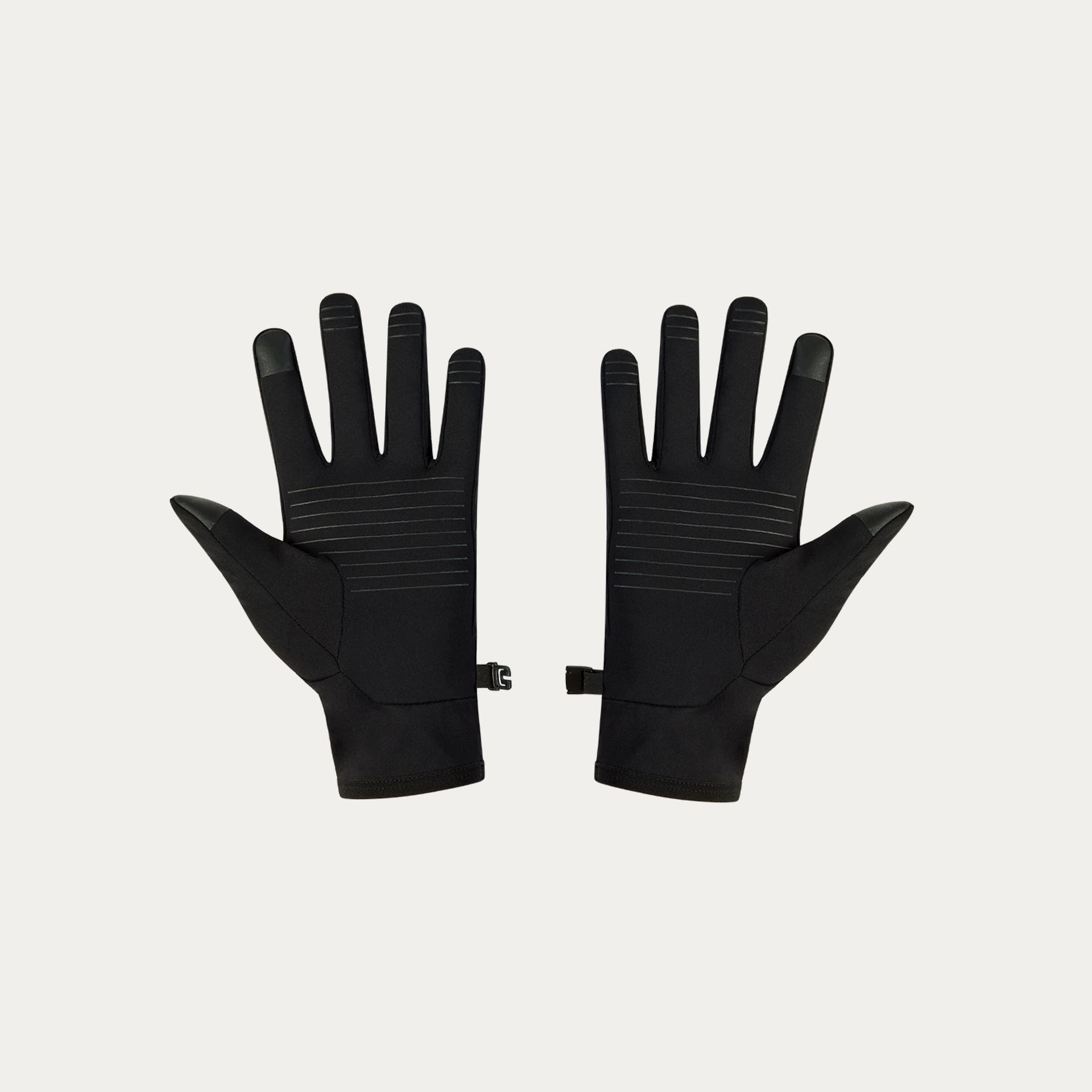 Pair of black running gloves on a light grey background