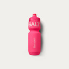 Pink water bottle with 'SALT' and 'puresport' branding on a light gray background