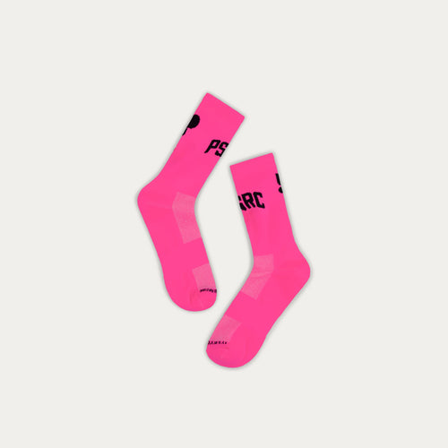 Pair of bright pink socks with black text on a light gray background