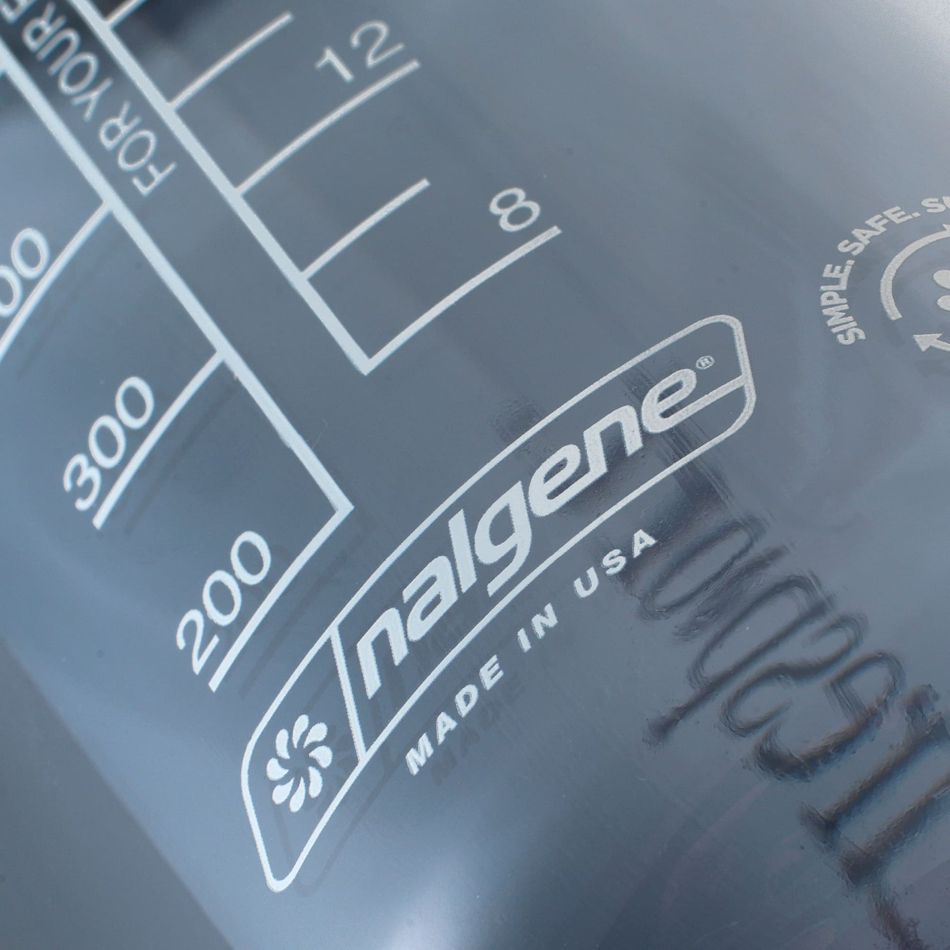 Nalgene water bottle from Puresport with a measurement scale and 'Made in USA' text.