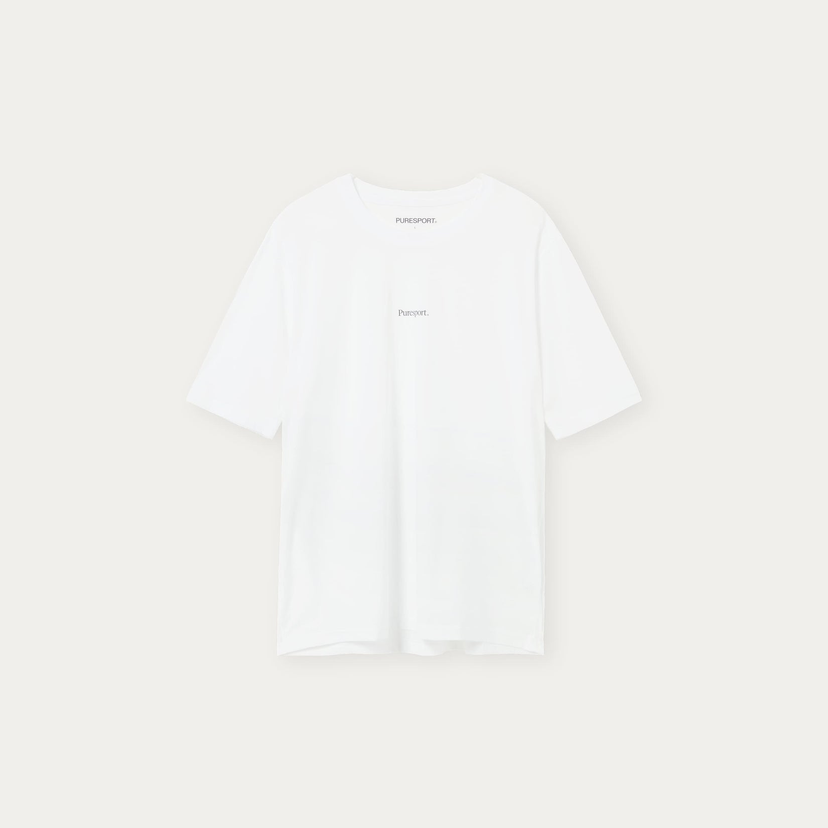 White run top with Puresport logo on a light beige background