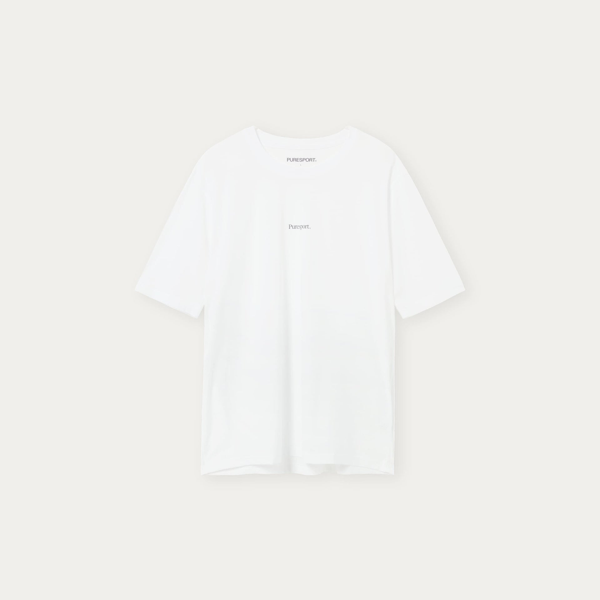 White run top with Puresport logo on a light beige background