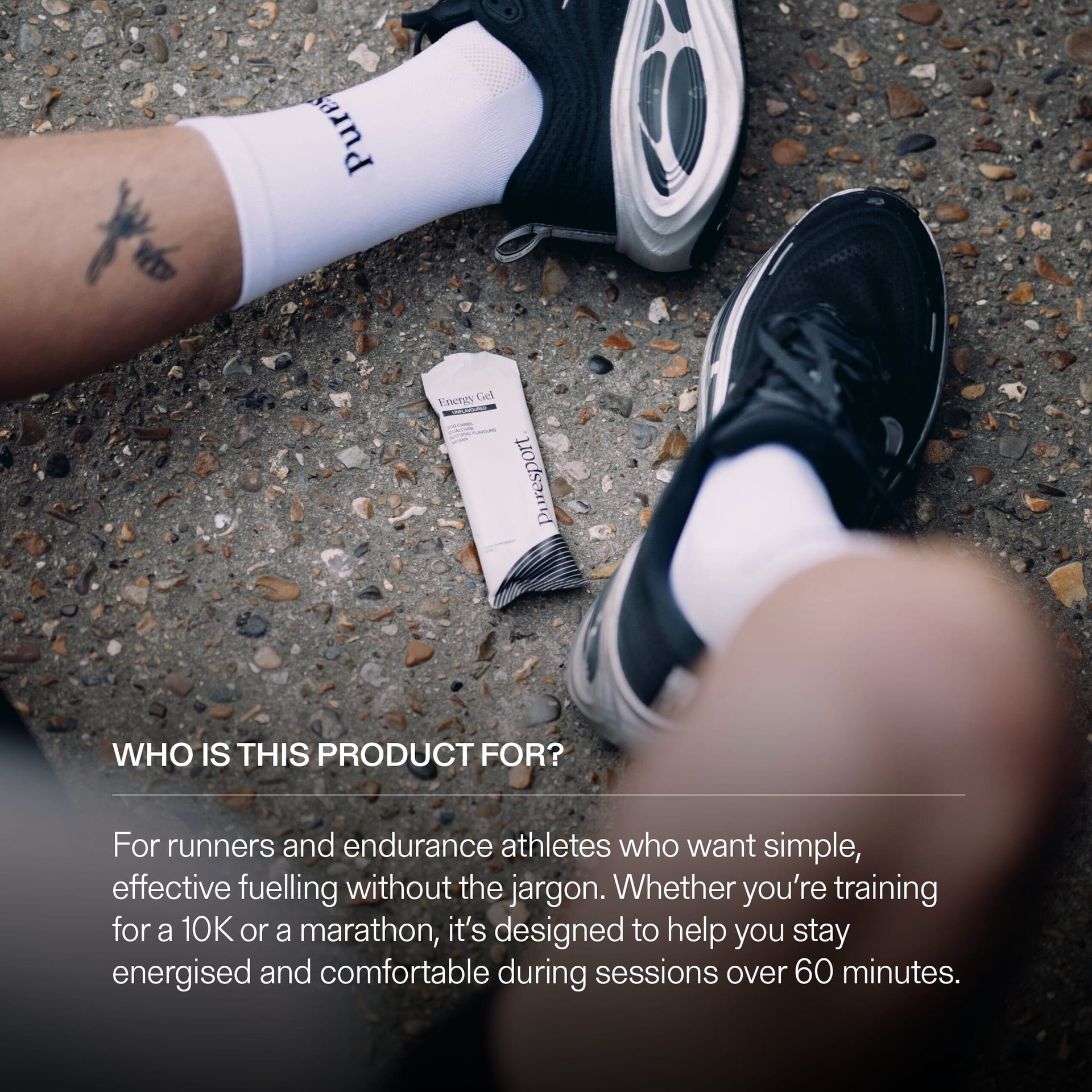 Person wearing running shoes and socks with a energy gel on the concrete with some info on effective fuelling. 