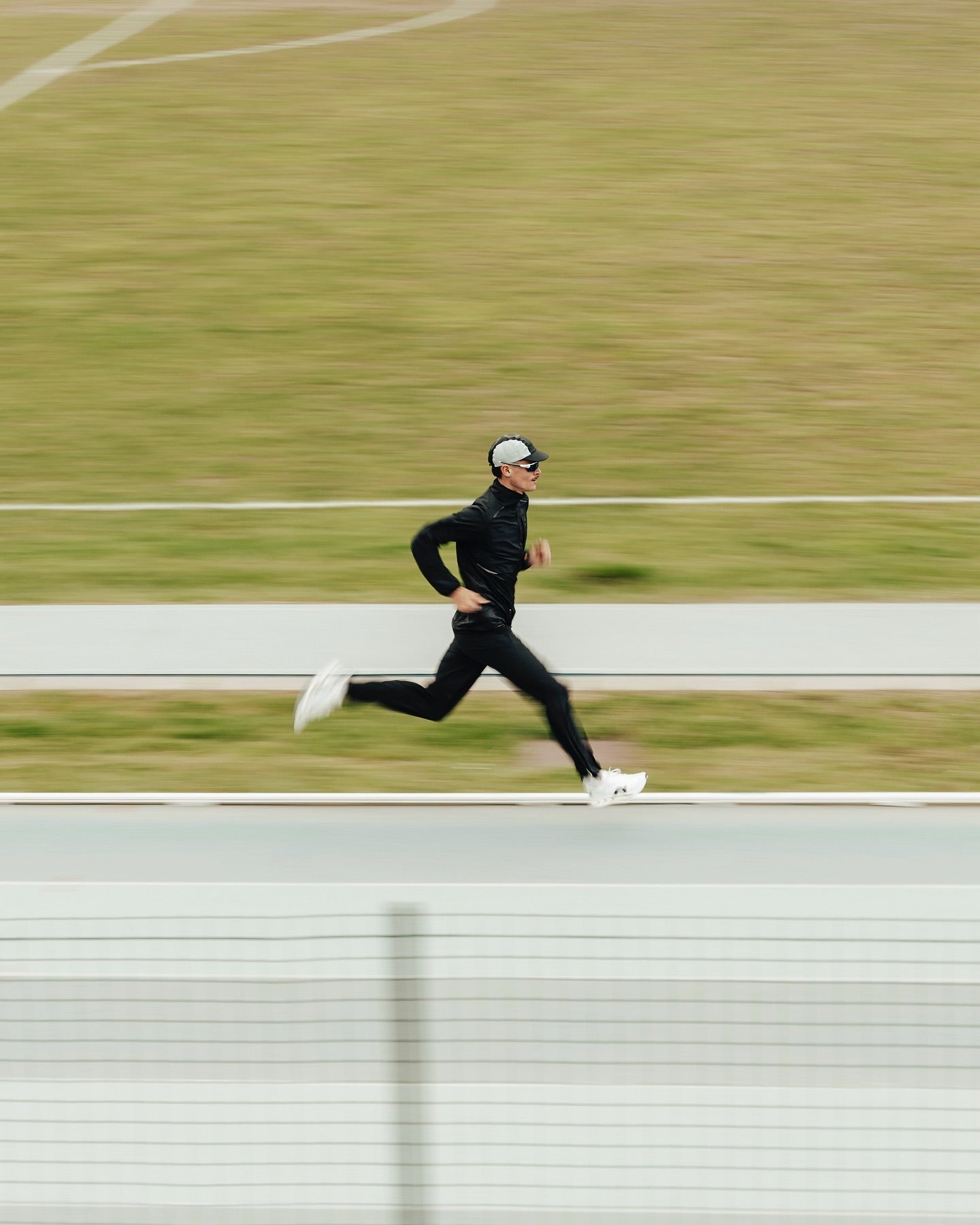 Runner in motion on a road during training